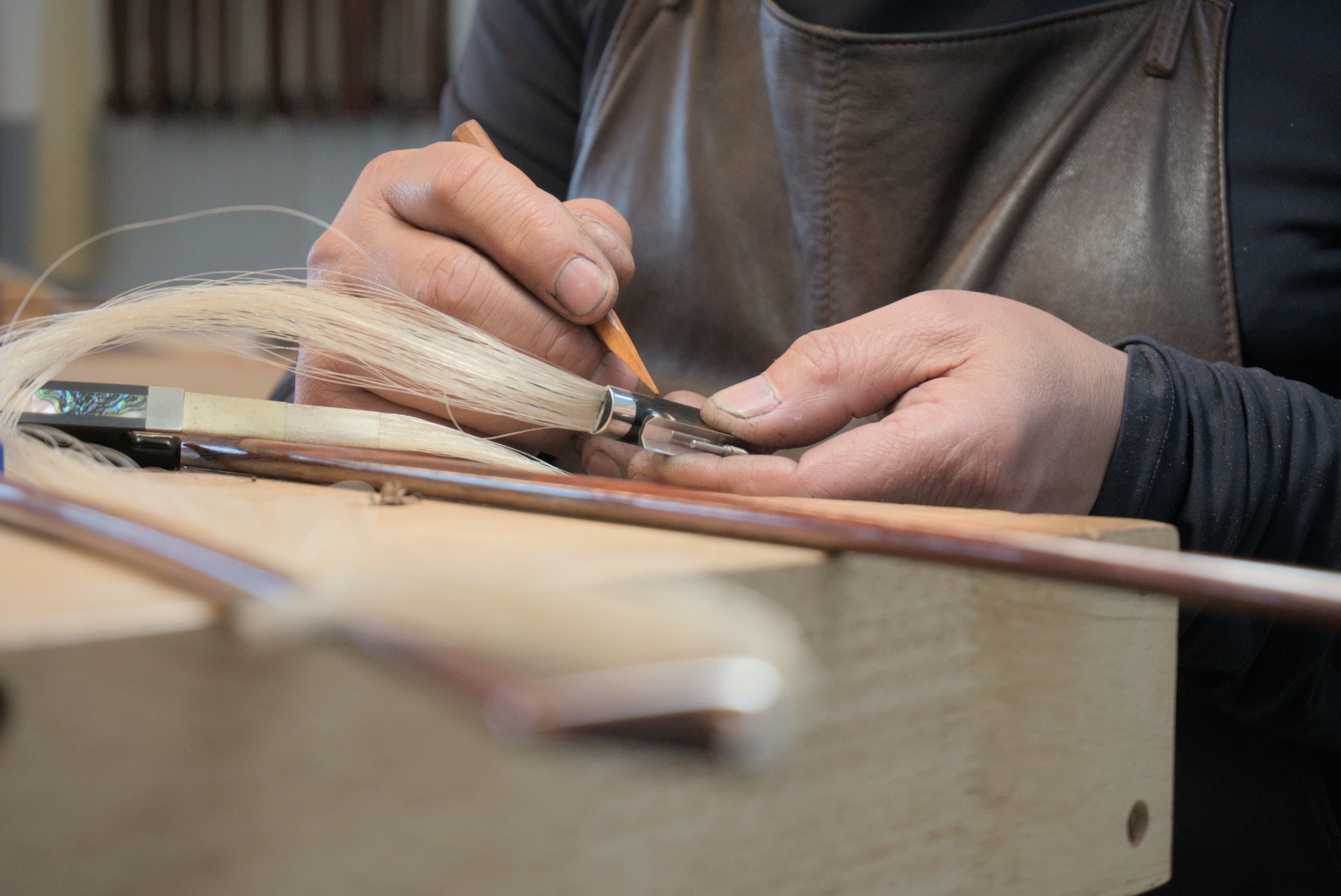 Craftsman working on a bow